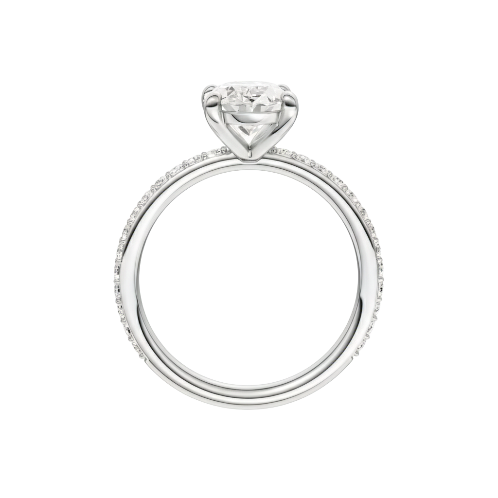 A profile view of the Oval cut diamond engagement ring in platinum with a prong diamond band and cathedral setting