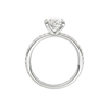 A profile view of the Oval cut diamond engagement ring in 14k white gold with a prong diamond band and cathedral setting