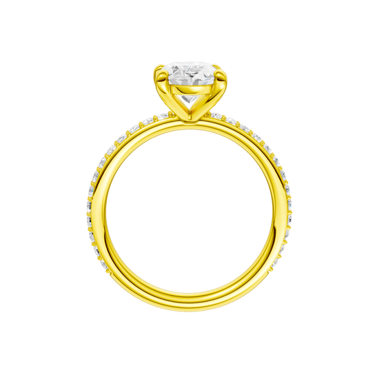 A profile view of the Oval cut diamond engagement ring in 14k yellow gold with a prong diamond band and cathedral setting
