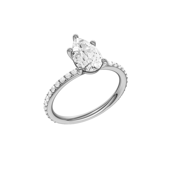 A three-quarter view of the Pear cut diamond engagement ring in 14k white gold with a prong diamond band and cathedral setting