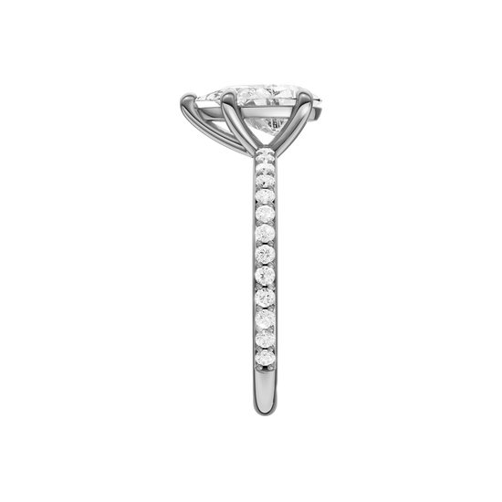 A side view of the Pear cut diamond engagement ring in 14k white gold with a prong diamond band and cathedral setting