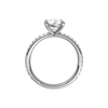A profile view of the Pear cut diamond engagement ring in 14k white gold with a prong diamond band and cathedral setting