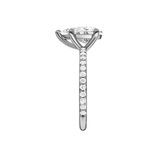 A side view of the Pear cut diamond engagement ring in platinum with a prong diamond band and cathedral setting