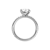 A profile view of the Pear cut diamond engagement ring in platinum with a prong diamond band and cathedral setting