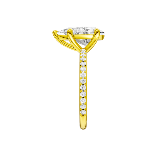 A side view of the Pear cut diamond engagement ring in 14k yellow gold with a prong diamond band and cathedral setting
