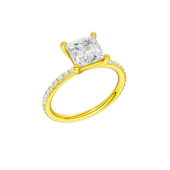 A three-quarter view of the Princess cut diamond engagement ring in 14k yellow gold with a prong diamond band and cathedral setting