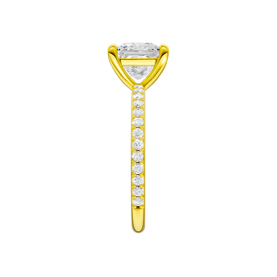 A side view of the Princess cut diamond engagement ring in 14k yellow gold with a prong diamond band and cathedral setting