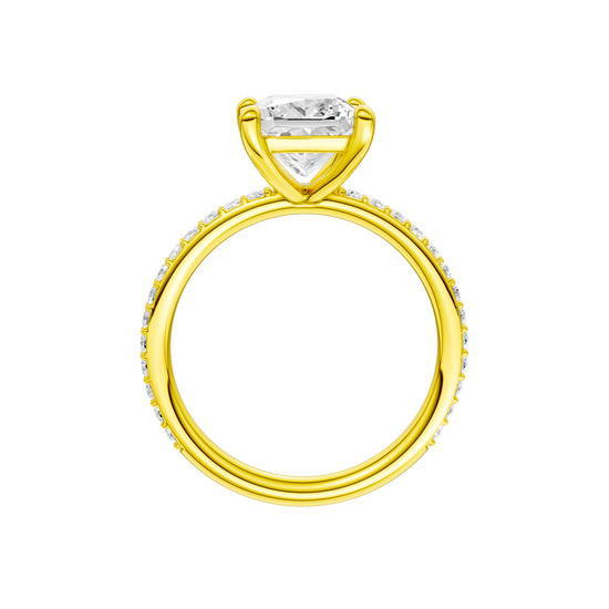 A profile view of the Princess cut diamond engagement ring in 14k yellow gold with a prong diamond band and cathedral setting