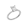 A three-quarter view of the radiant cut diamond engagement ring in 14k white gold with a prong diamond band and cathedral setting
