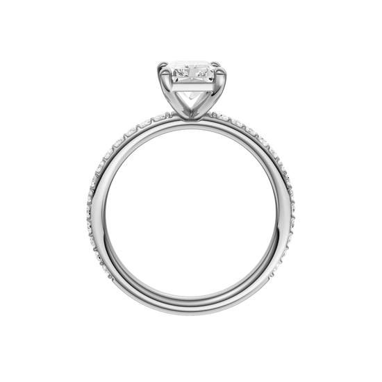 A profile view of the radiant cut diamond engagement ring in 14k white gold with a prong diamond band and cathedral setting