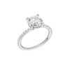 A three-quarter view of the Round cut diamond engagement ring in platinum with a prong diamond band and cathedral setting