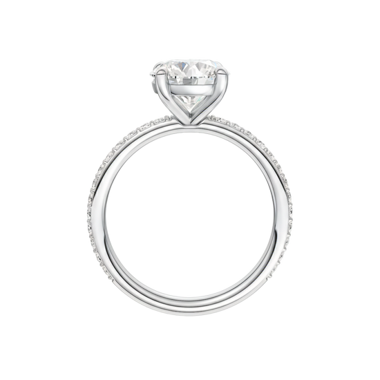 A profile view of the Round cut diamond engagement ring in 14k white gold with a prong diamond band and cathedral setting