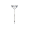 A side view of the Elongated cushion cut diamond engagement ring in 14k white gold with a prong diamond band and cathedral setting