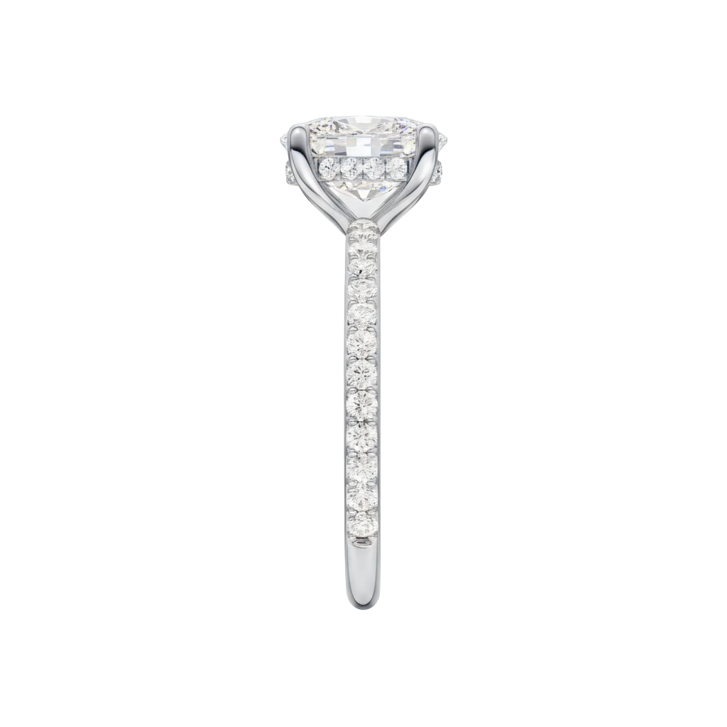 A side view of the Elongated cushion cut diamond engagement ring in platinum with a prong diamond band and cathedral setting