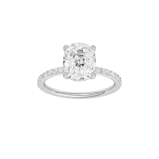 A front view of the Elongated cushion cut diamond engagement ring in platinum with a prong diamond band and cathedral setting