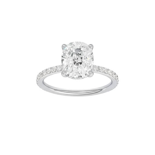 A front view of the Elongated cushion cut diamond engagement ring in 14k white gold with a prong diamond band and cathedral setting