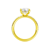 A profile view of the Elongated cushion cut diamond engagement ring in 14k yellow gold with a prong diamond band and cathedral setting