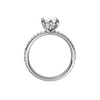 A profile view of the Marquise cut diamond engagement ring in 14k white gold with a prong band and hidden halo setting