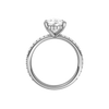 A profile view of the Pear cut diamond engagement ring in platinum with a prong diamond band and cathedral setting