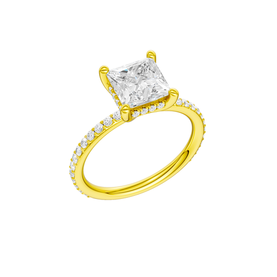A three-quarter view of the Princess cut diamond engagement ring in 14k yellow gold with a prong diamond band and cathedral setting