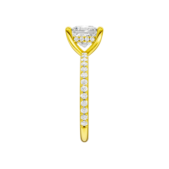 A side view of the Princess cut diamond engagement ring in 14k yellow gold with a prong diamond band and cathedral setting