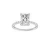 A front view of the Radiant cut diamond engagement ring in 14k white gold with a diamond band and hidden halo, cathedral setting