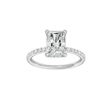 A front view of the Radiant cut diamond engagement ring in 14k white gold with a diamond band and hidden halo, cathedral setting