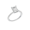 A three-quarter view of the Radiant cut diamond engagement ring in 14k white gold with a diamond band and hidden halo, cathedral setting