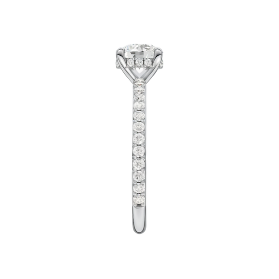 A side view of the Round cut diamond engagement ring in 14k white gold with a prong diamond band and cathedral setting