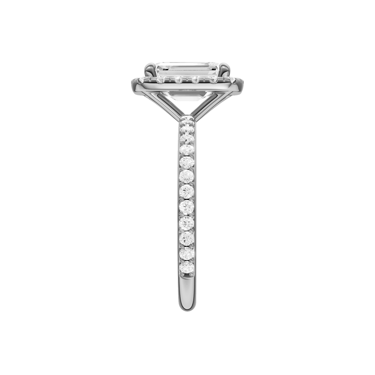 A side view of the Emerald cut diamond engagement ring in 14k white gold with a prong diamond band and cathedral setting