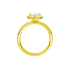 A profile view of the Marquise cut diamond engagement ring in 14k yellow gold with a prong diamond band and cathedral setting