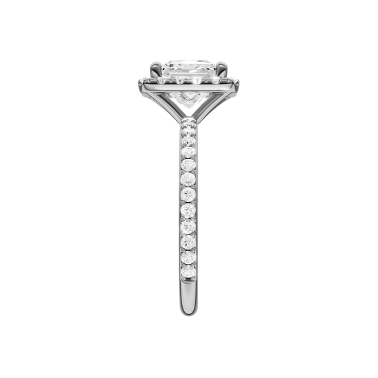 A side view of the Princess cut diamond engagement ring in 14k white gold with a prong diamond band and cathedral setting