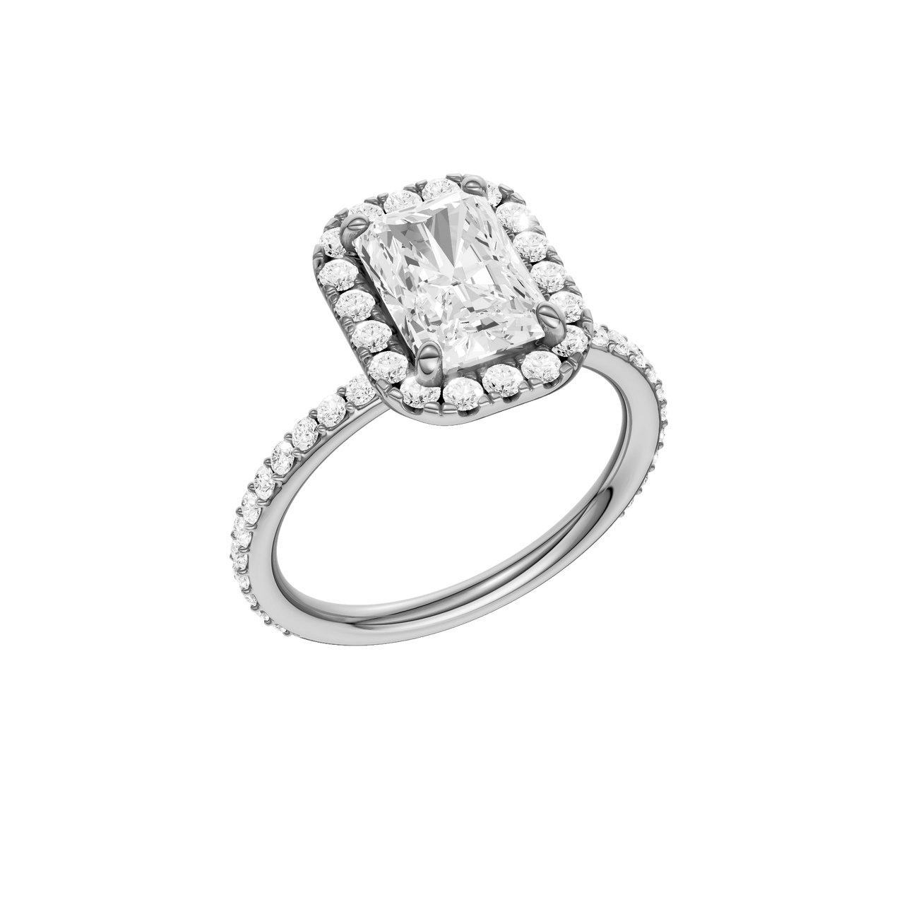 A three-quarter view of the radiant cut diamond engagement ring in platinum with a prong diamond band and cathedral setting