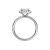 A profile view of the radiant cut diamond engagement ring in platinum with a prong diamond band and cathedral setting