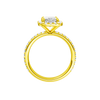 A profile view of the radiant cut diamond engagement ring in 14k yellow gold with a prong diamond band and cathedral setting