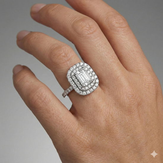 Emerald cut diamond engagement ring in 14k white gold with a prong diamond band and cathedral setting on a hand