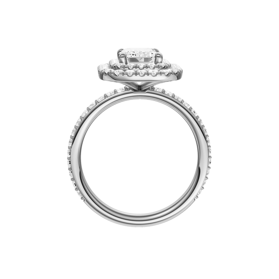 A profile view of the Emerald cut diamond engagement ring in platinum with a prong diamond band and cathedral setting