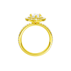 A profile view of the Marquise cut diamond engagement ring in 14k yellow gold with a prong diamond band and cathedral setting