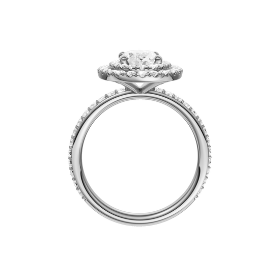 A profile view of the Oval cut diamond engagement ring in 14k white gold with a prong diamond band and cathedral setting