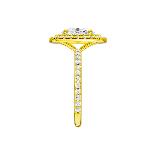 A side view of the Oval cut diamond engagement ring in 14k yellow gold with a prong diamond band and cathedral setting