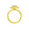 A profile view of the Radiant cut diamond engagement ring in 14k yellow gold with a prong diamond band and cathedral setting