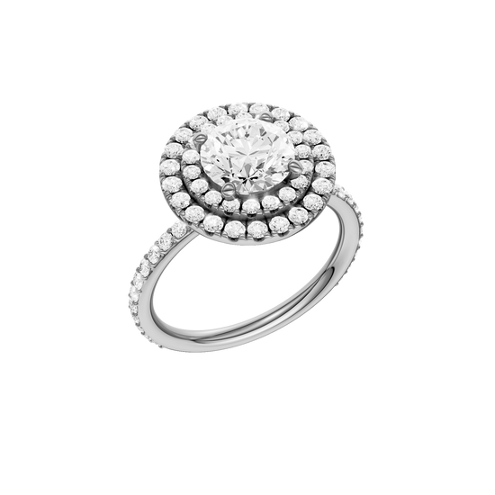 A three-quarter view of the Round cut diamond engagement ring in 14k white gold with a prong diamond band and cathedral setting