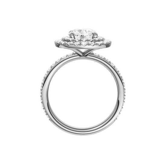 A profile view of the Round cut diamond engagement ring in 14k white gold with a prong diamond band and cathedral setting