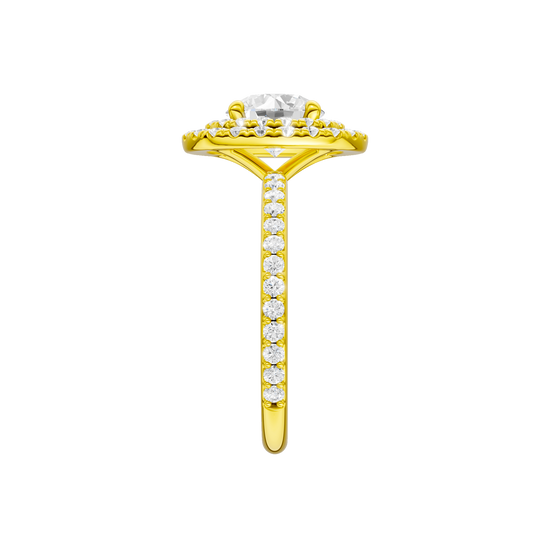 A side view of the Round cut diamond engagement ring in 14k yellow gold with a prong diamond band and cathedral setting