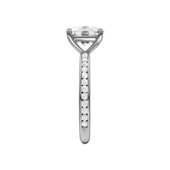 A side view of the Elongated cushion cut diamond engagement ring in platinum with a diamond channel band and cathedral setting