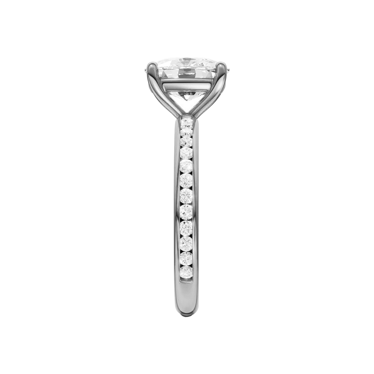 A side view of the Elongated cushion cut diamond engagement ring in platinum with a diamond channel band and cathedral setting