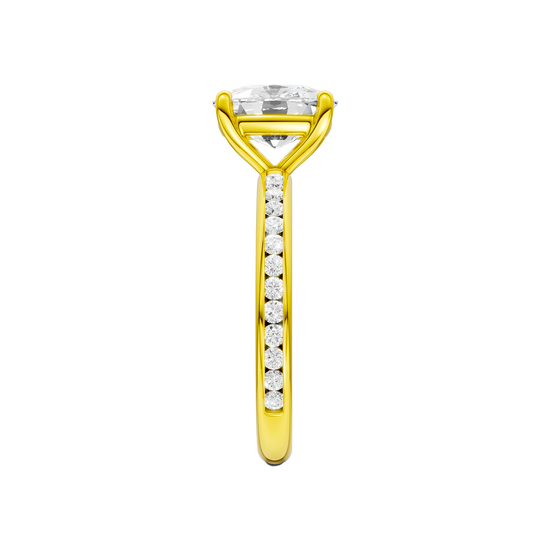 A side view of the Elongated cushion cut diamond engagement ring in 14k yellow gold with a diamond channel band and cathedral setting