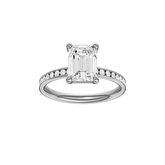 A front view of the Emerald cut diamond engagement ring in 14k white gold with a diamond channel band and cathedral setting
