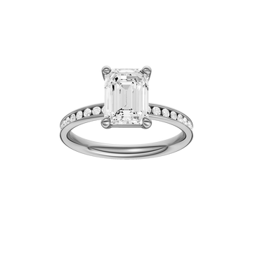 A front view of the Emerald cut diamond engagement ring in 14k white gold with a diamond channel band and cathedral setting
