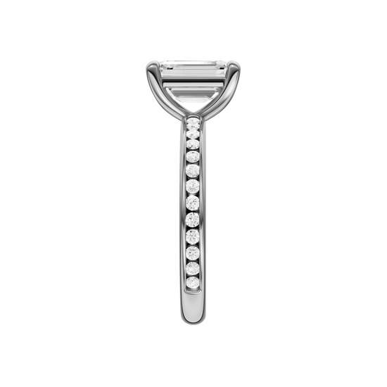 A side view of the Emerald cut diamond engagement ring in platinum with a diamond channel band and cathedral setting